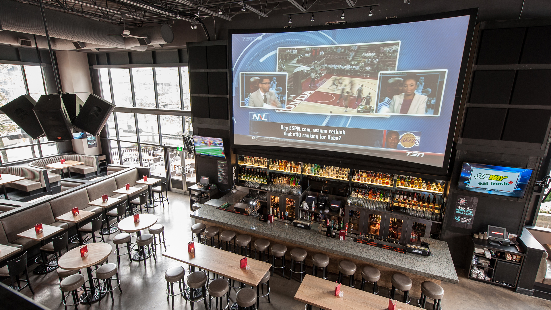 291-inch custom curved HD projection screen at Boston Pizza Stadium District Vancouver